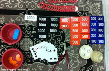 POLICE BUST ILLEGAL GAMBLING DEN