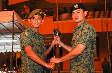 NEW CHIEF GUARDS OFFICER FOR SINGAPORE