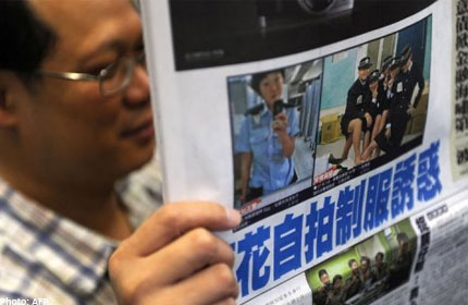 Hong Kong probes 'racy' policewomen photos