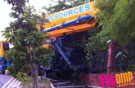 Singapore Crane Accident Picture on Crane Rolls Into Siglap Home