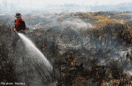 Singapore puts heat on Indonesia to take on haze situation