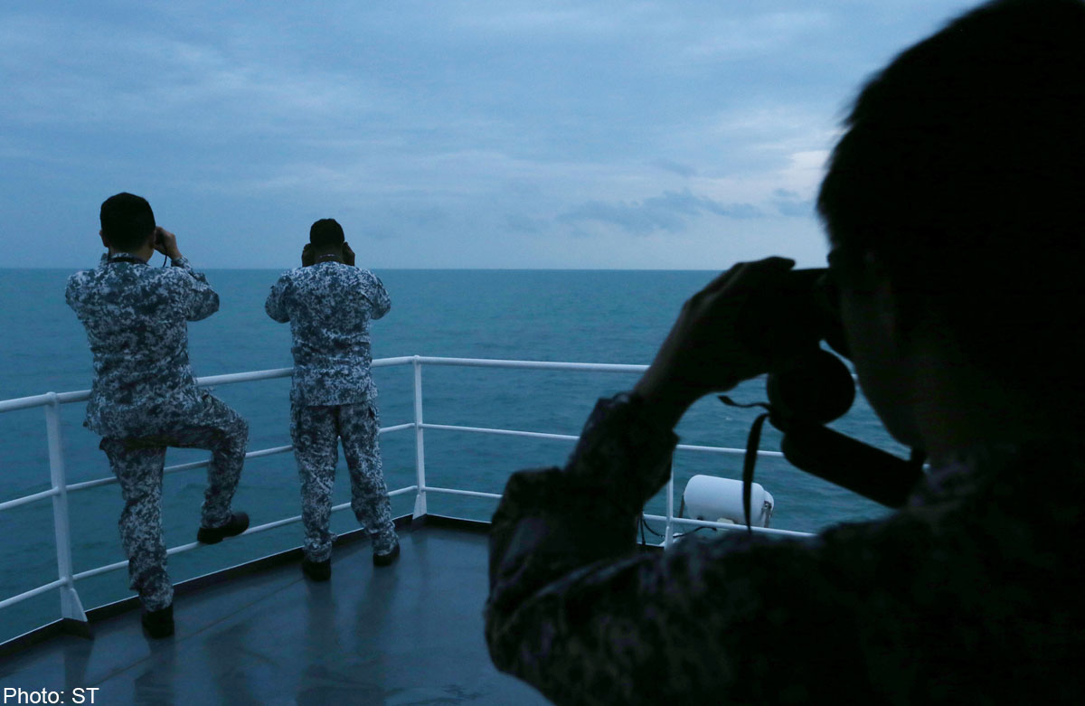 Weather Stalls Search for AirAsia Black Boxes; First Victim Buried.