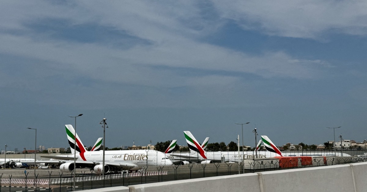Emirates' planes sit on the tarmac of Dubai International Airport (DXB) after two drones came down in the vicinity of the airport, amid the U.S.-Israeli conflict with Iran, in Dubai, United Arab Emirates, March 11, 2026.