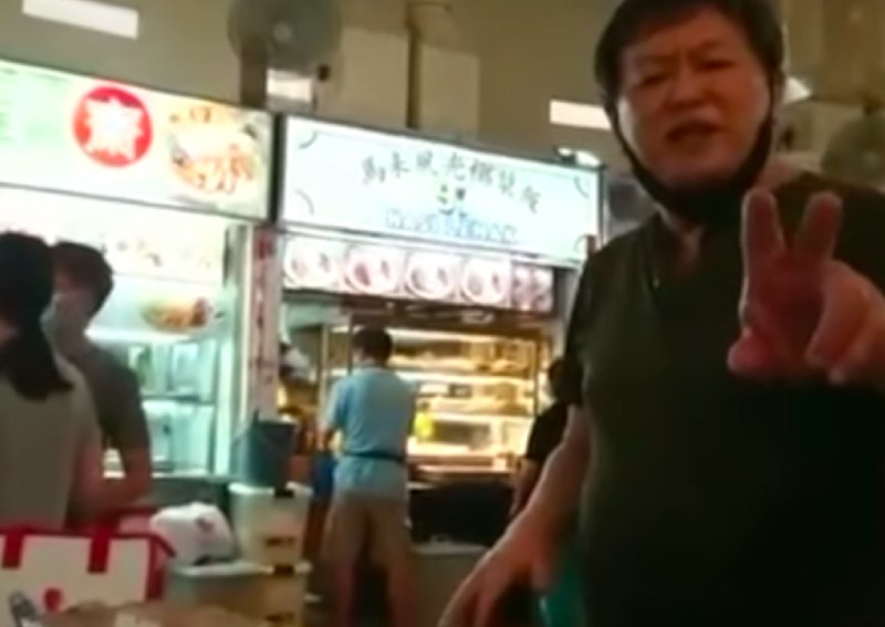 The hawker accused the couple of removing his items to dine on "his table".