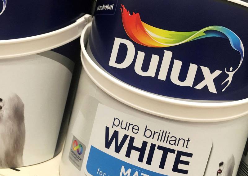  Cans of Dulux paint, an Akzo Nobel brand, are seen on the shelves of a hardware store near Manchester, Britain, on April 24, 2017. PHOTO: Reuters file