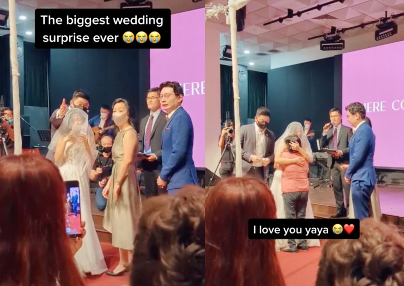 Kelly Chua's (in white gown) brother revealing the big surprise at her wedding.