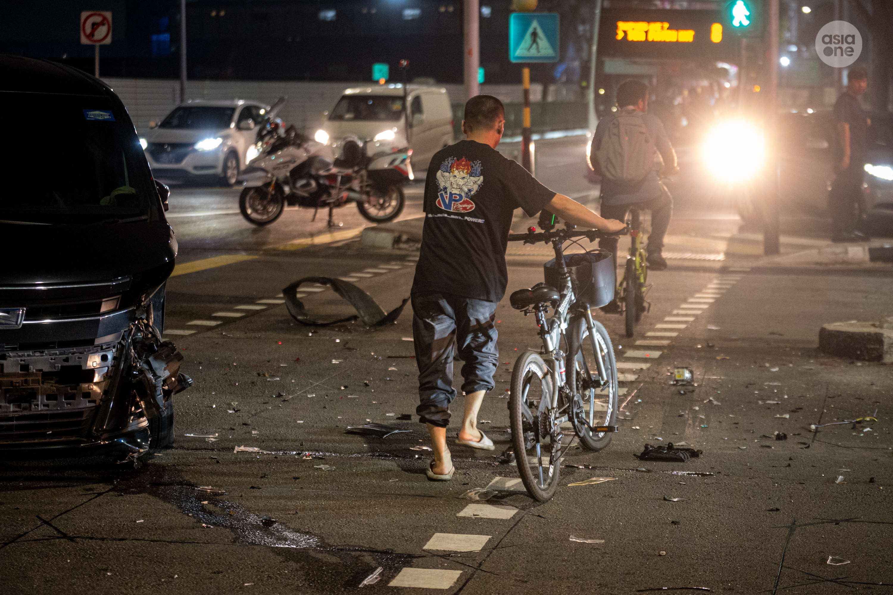 Debris was strewn across one lane on each side of Bedok Reservoir Road. 