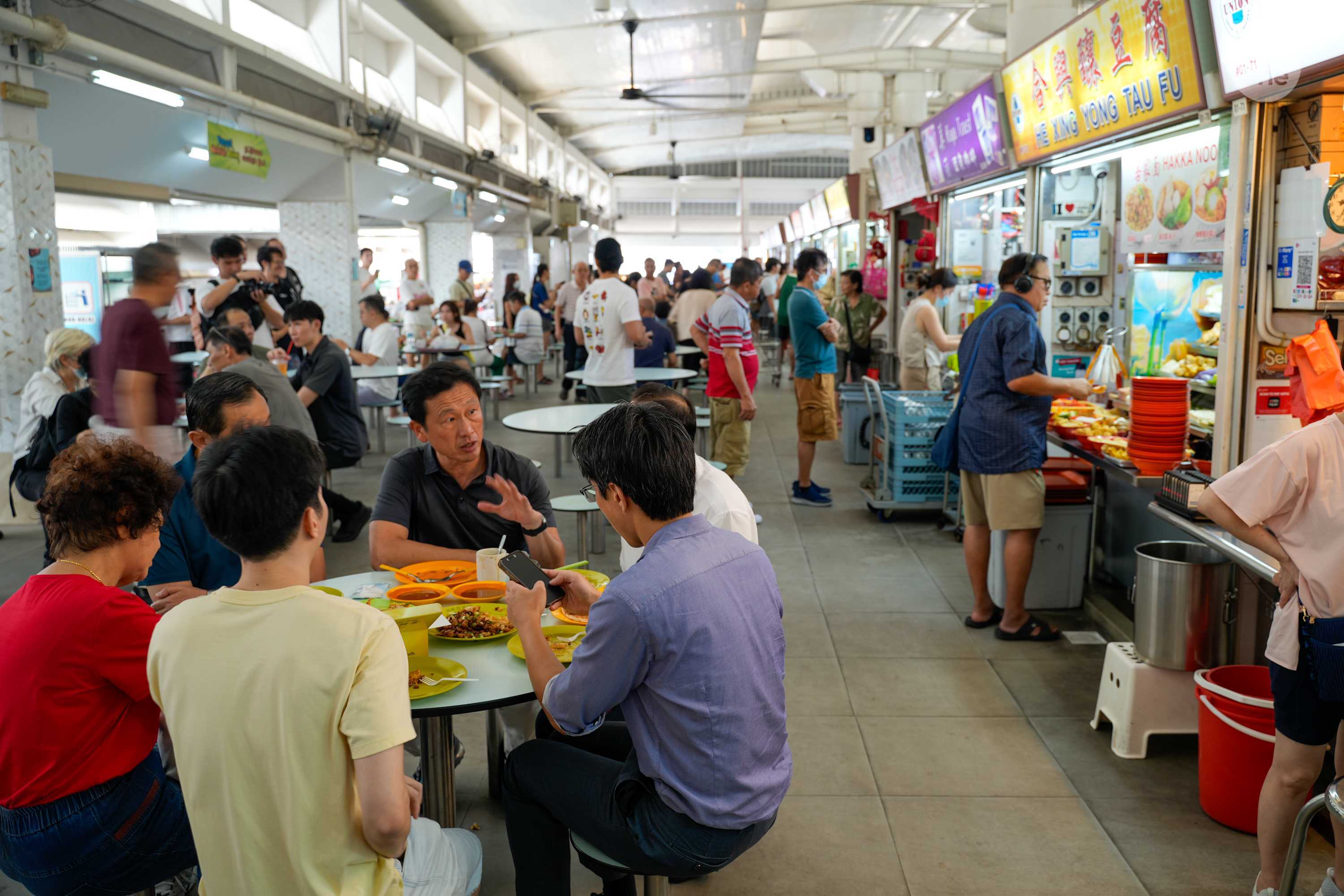 Health Minister Ong Ye Kung, Senior Minister of State Tan Kiat How and chief executive officer of the Communicable Diseases Agency Prof Vernon Lee joined residents for breakfast at Bedok 216 Food Centre.