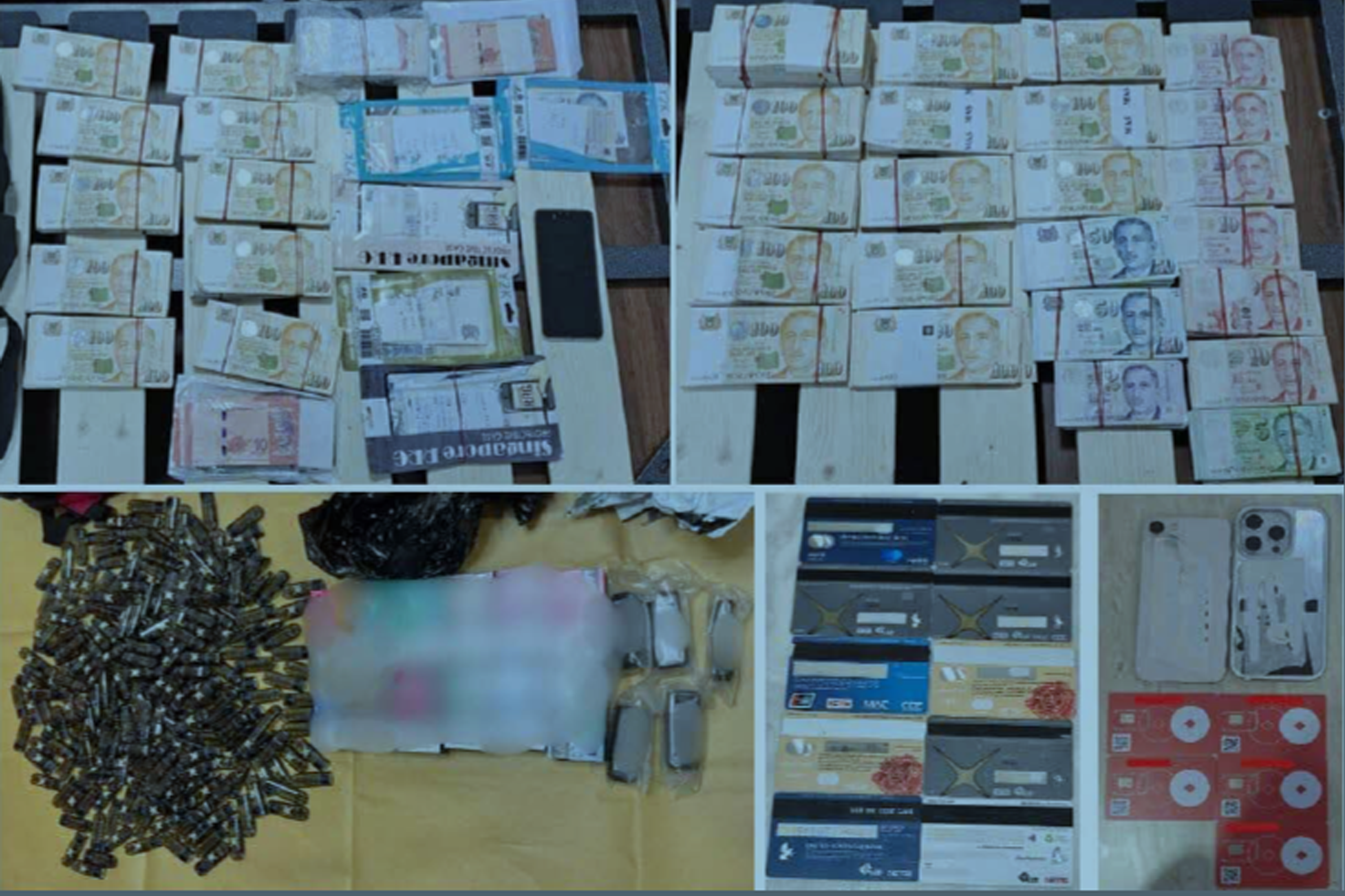 Cash, bank cards, SIM cards and vapes seized during the enforcement operation.