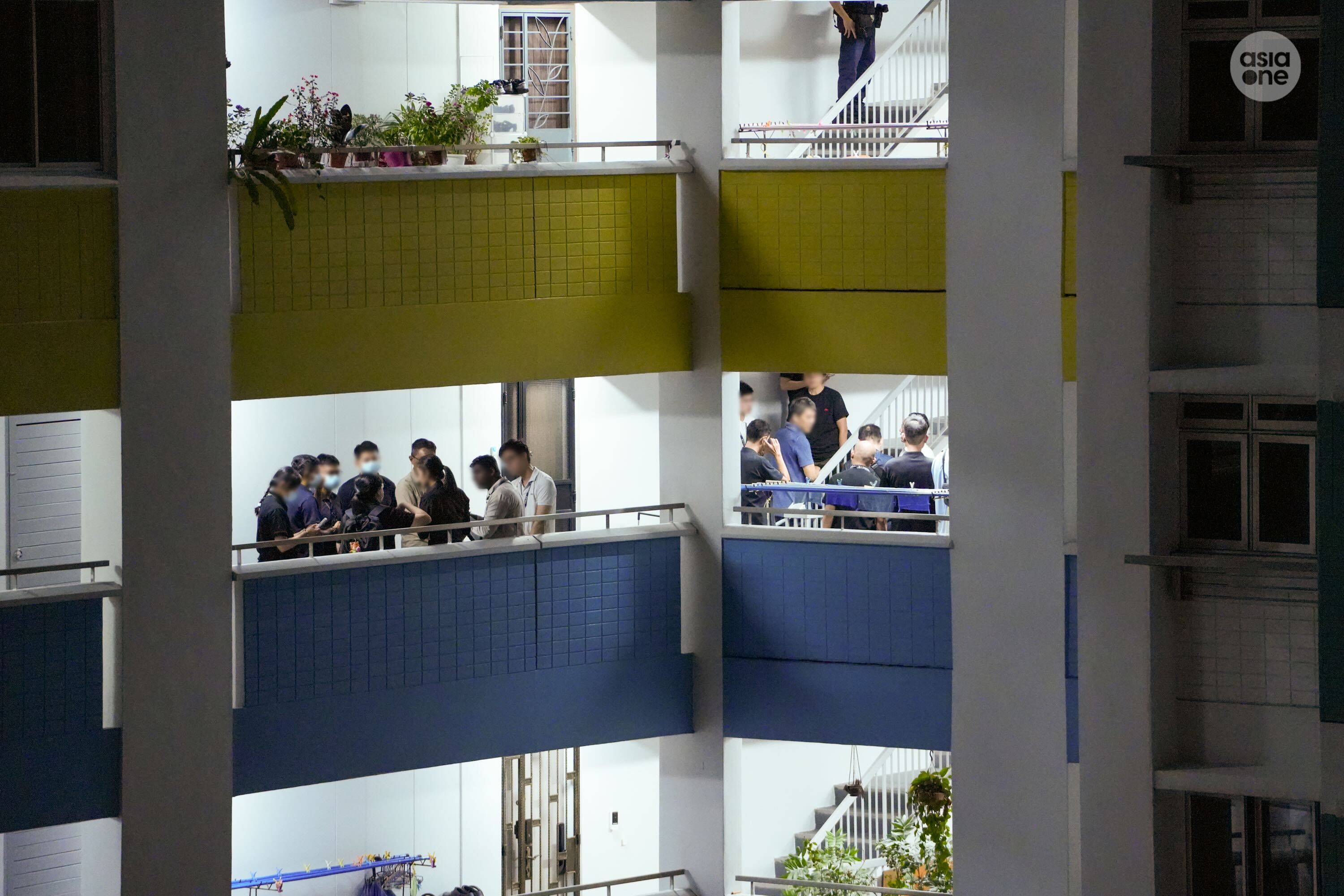 Multiple police officers were seen at the 12th and 13th floors of the block.