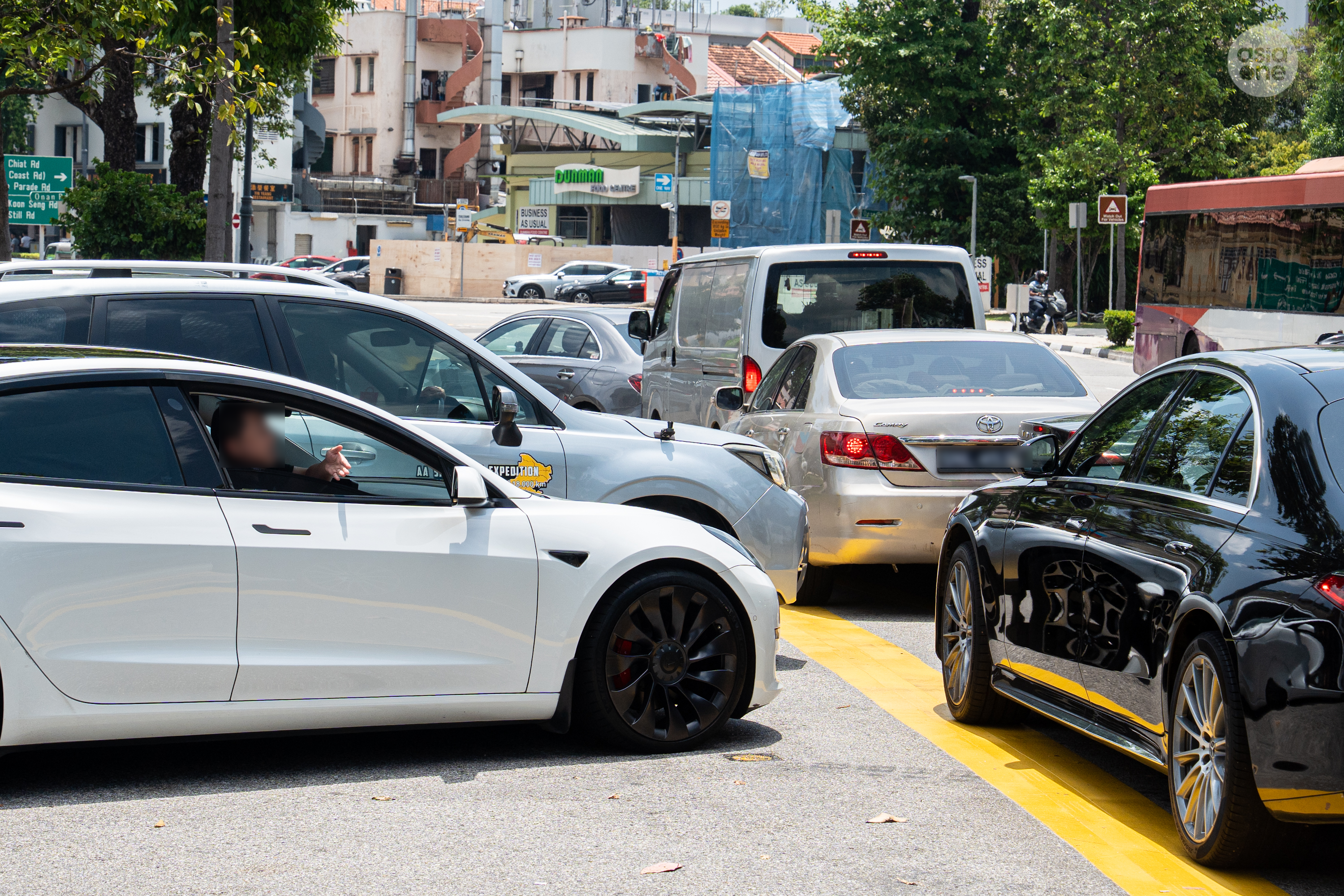 An angry exchange between two drivers along Dunman Road.