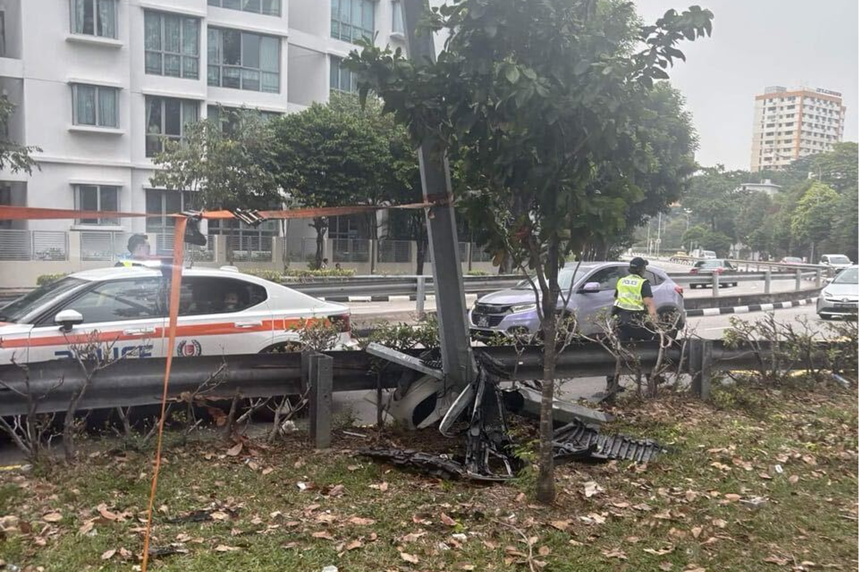 A lamp post along Guillemard Road damaged in the accident.