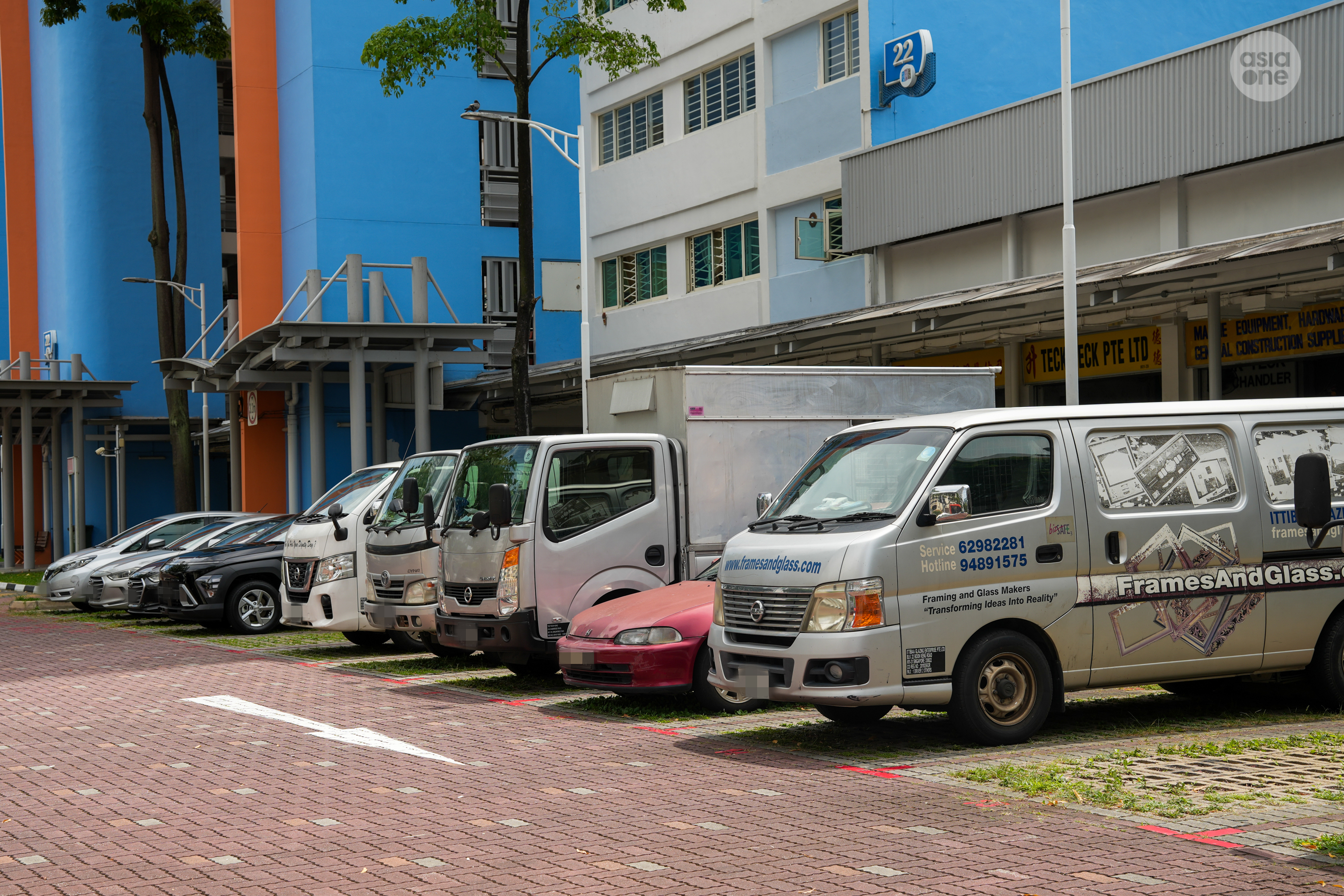 Commercial vehicles belonging to SMEs parked at a HDB car park along Bendemeer Road on Monday (June 7).
