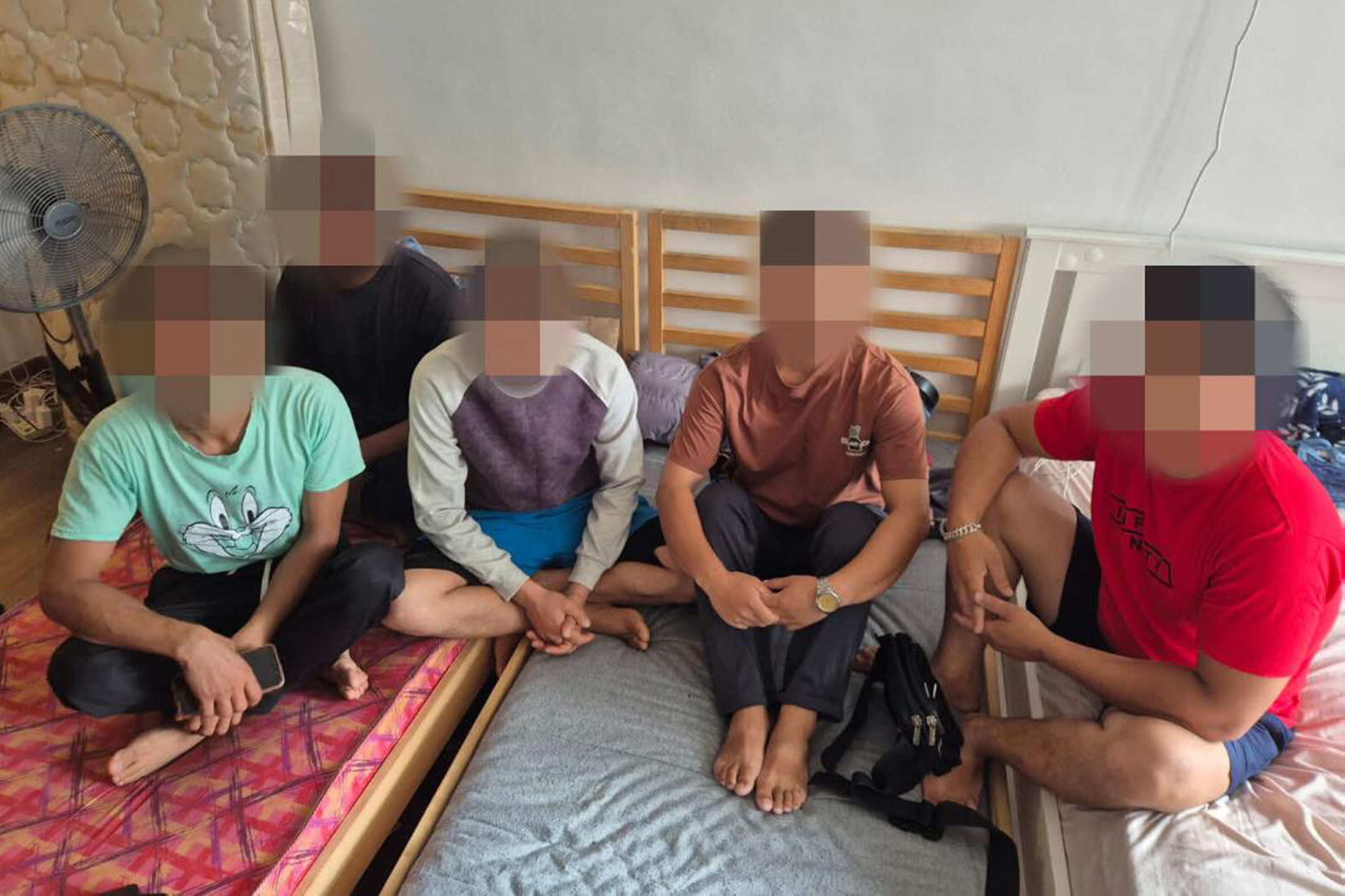 Five of the immigration offenders arrested during the MOM-ICA joint operation on March 10.