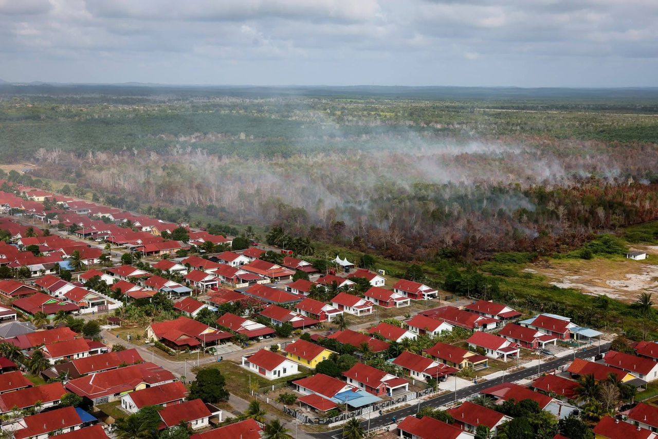 An aerial view of the ongoing peatland fire in Kota Tinggi.