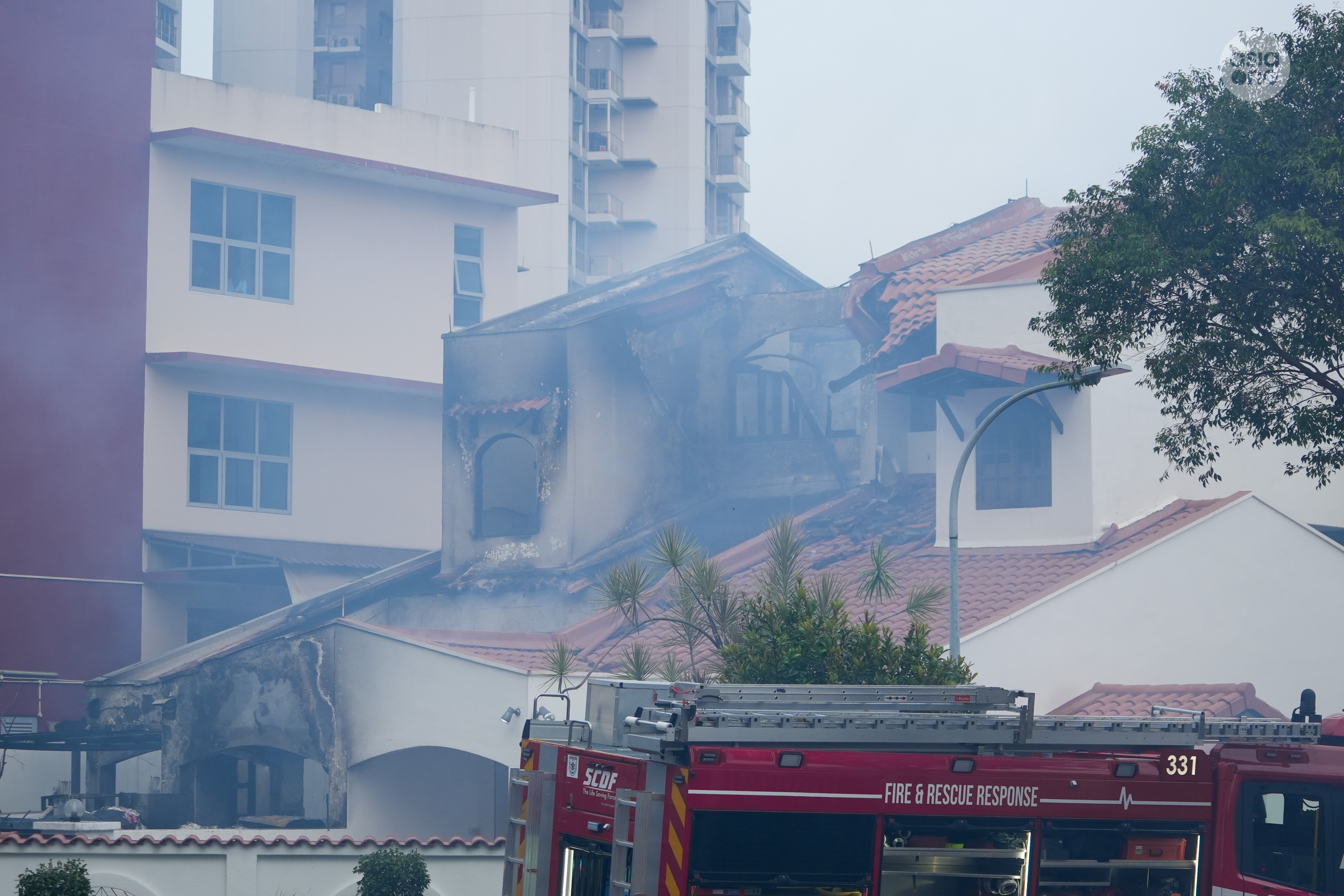 A section of the affected property's tiled roof caved in after the fire.