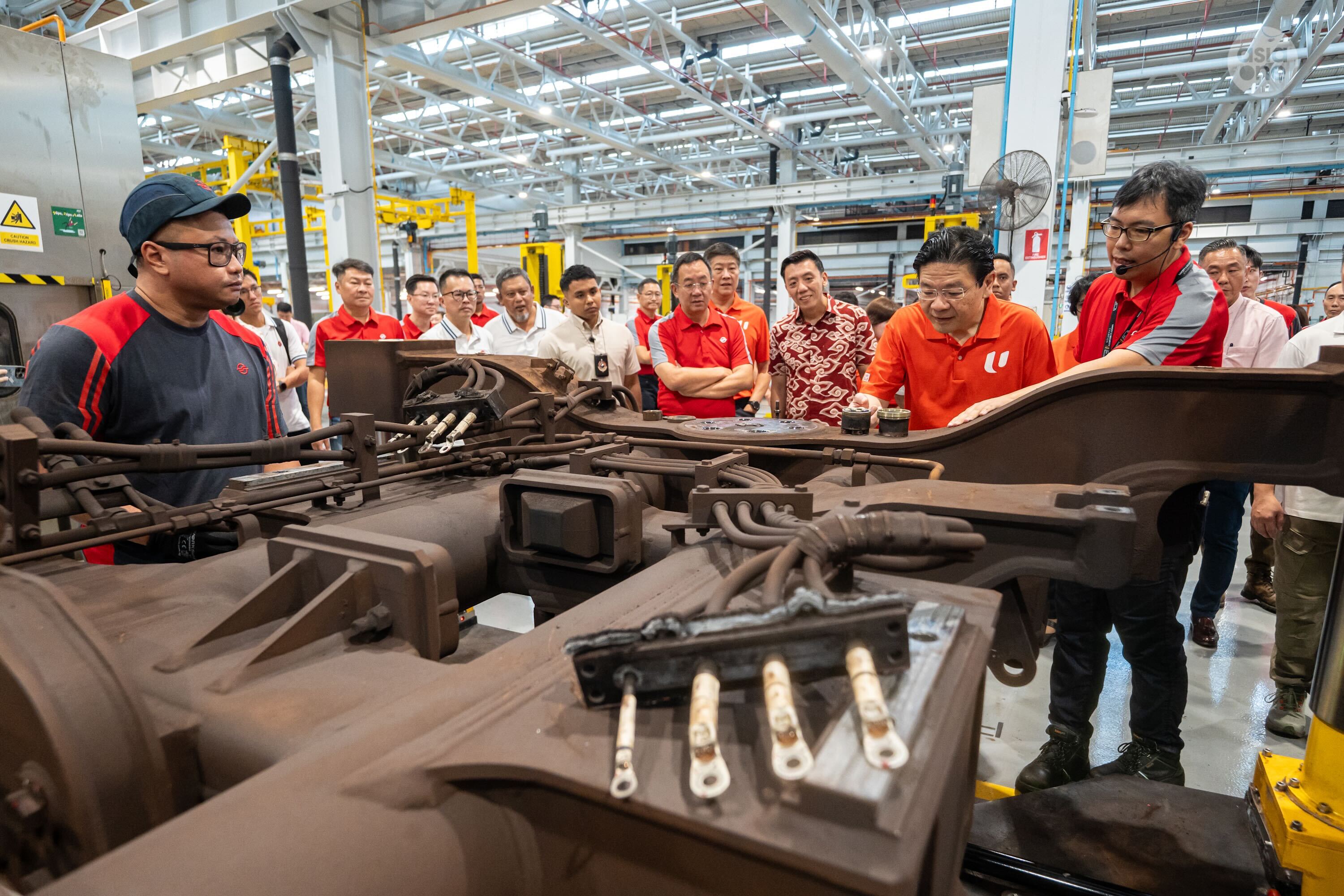 During his visit to SMRT's Bishan Depot, PM Wong was introduced to some of the transformative initiatives which helped improve worker productivity and safety.