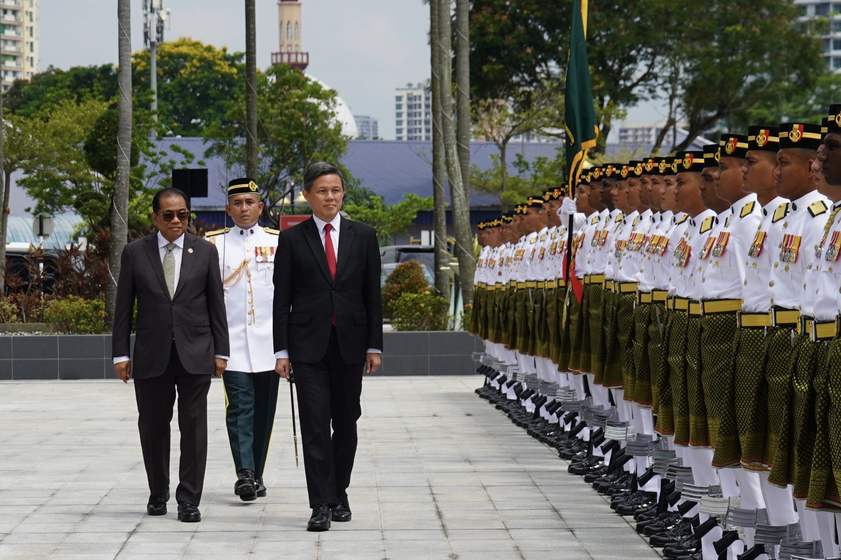Defence Minister Chan Chun Sing inspecting the Guard of Honour at the Malaysia Ministry of Defence on Monday afternoon (Aug 26). 