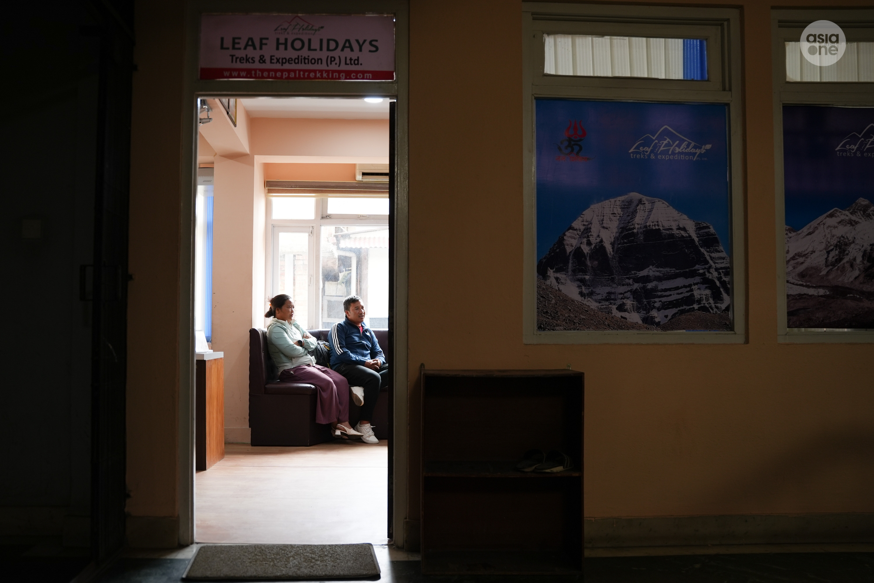 Family members of missing staff members of Leaf Holidays speak with Gopal. 