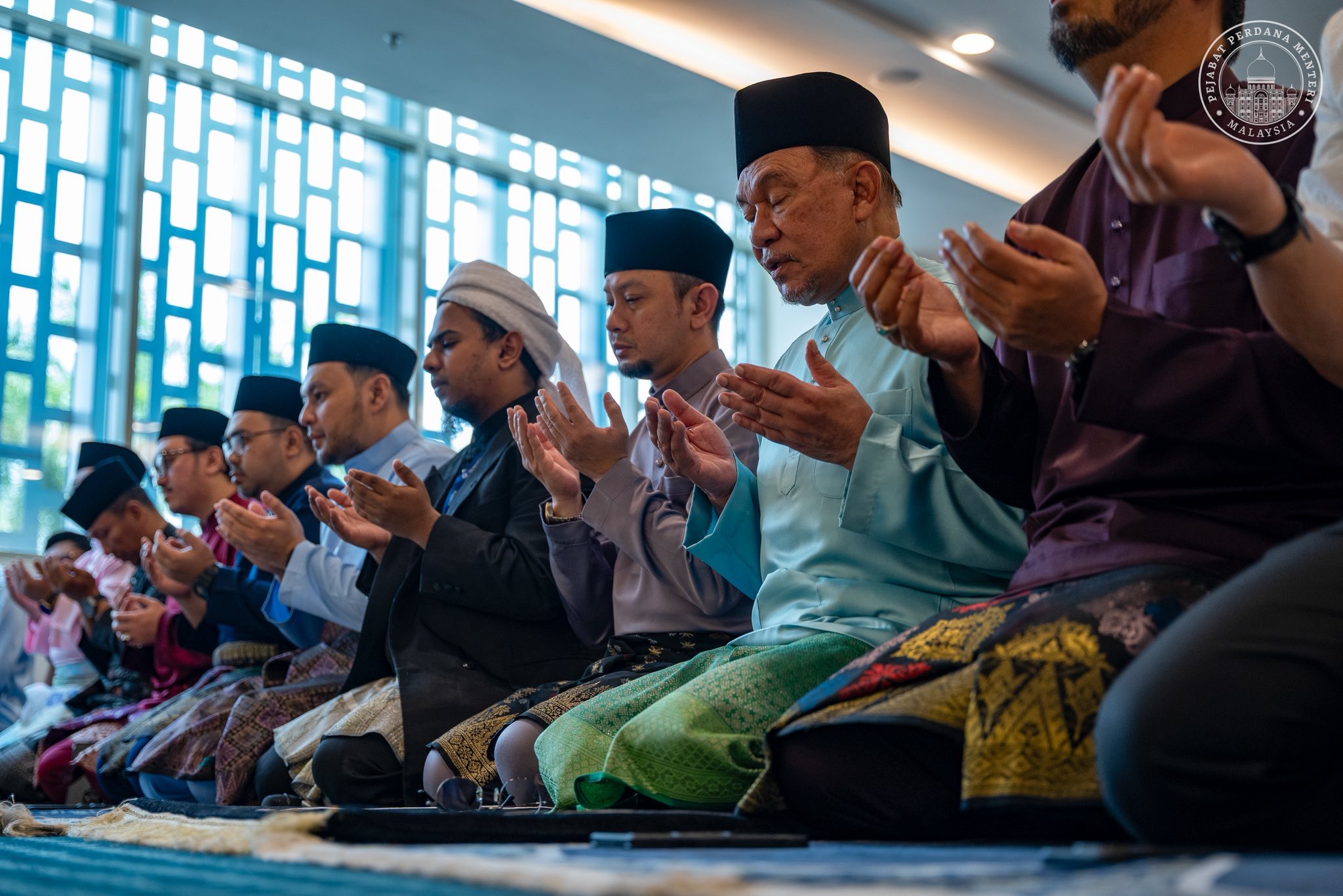 Malaysian PM Anwar Ibrahim performing Friday prayers at IOI City Mall in Putrajaya on Friday (March 6).