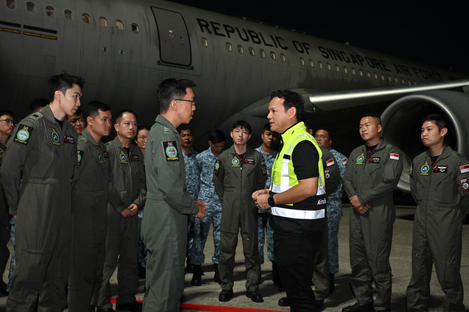 Senior Minister of State for Defence Zaqy Mohamad speaking to the RSAF A330 MRTT mission crew at Changi Airport on Wednesday (March 11) morning.