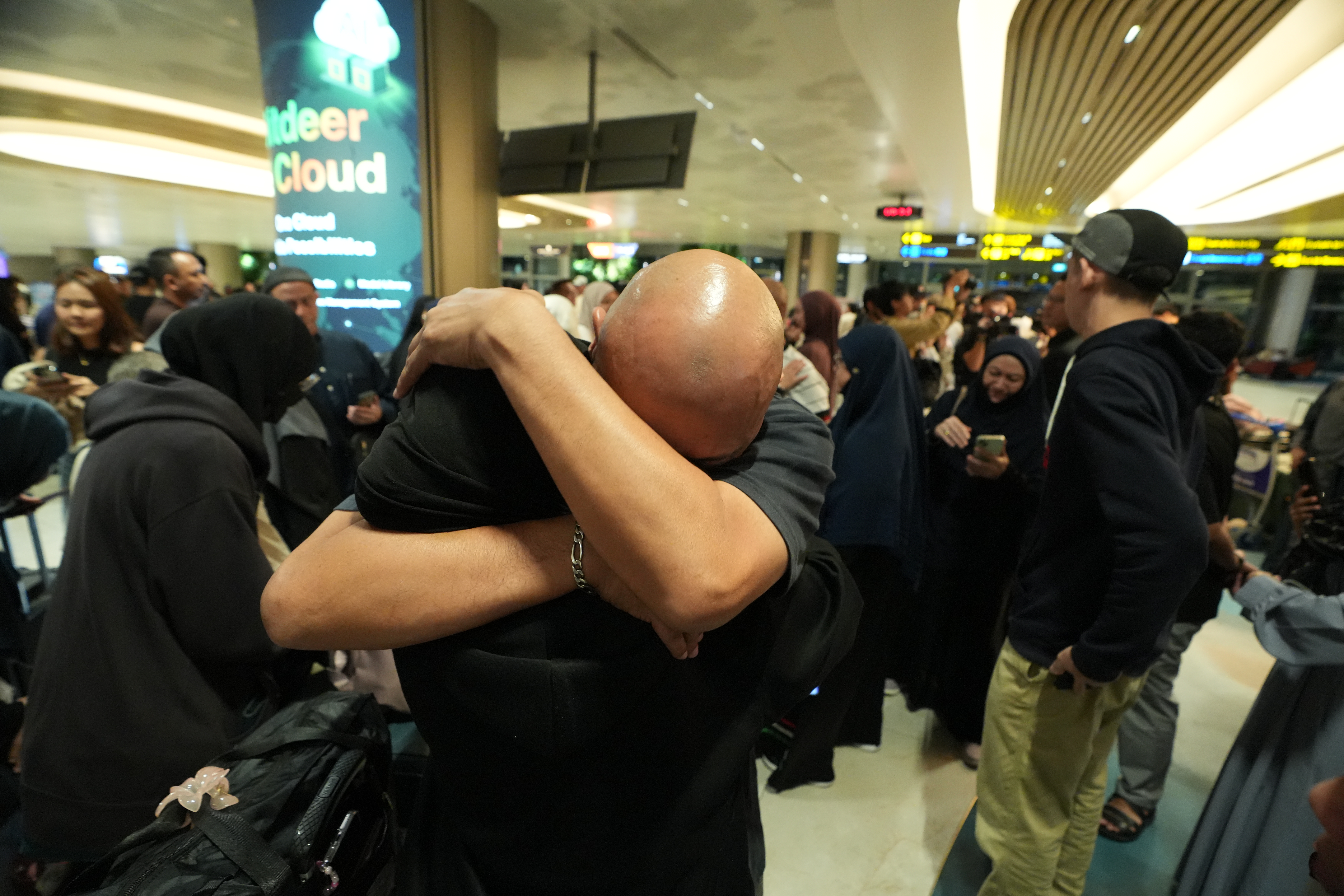 Nur Nadhrah Badriah Binte Mohamad Murtazam's father didn't say anything but simply hugged her tightly for about a minute.