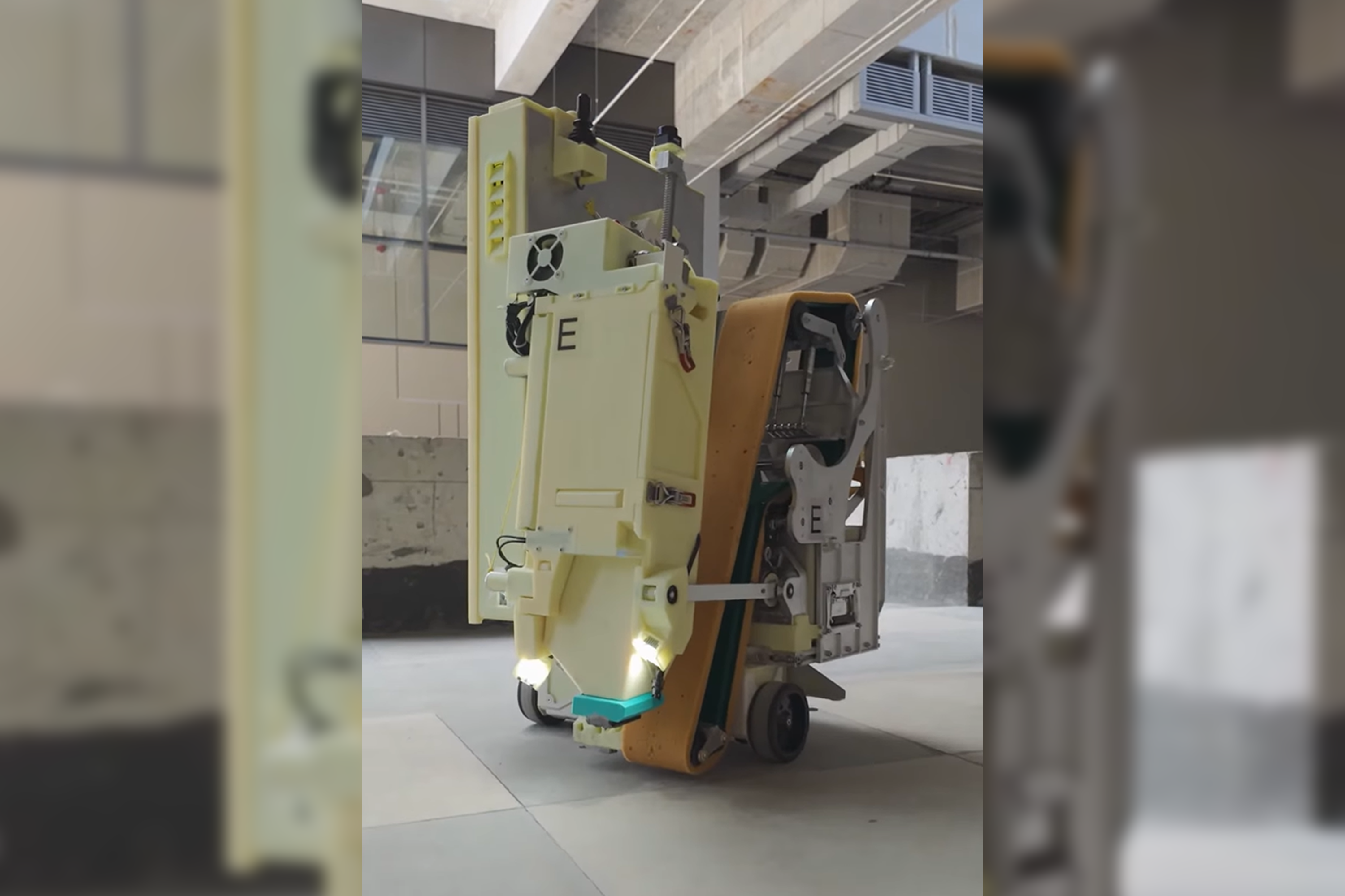 A tile-grouting robot in action.
