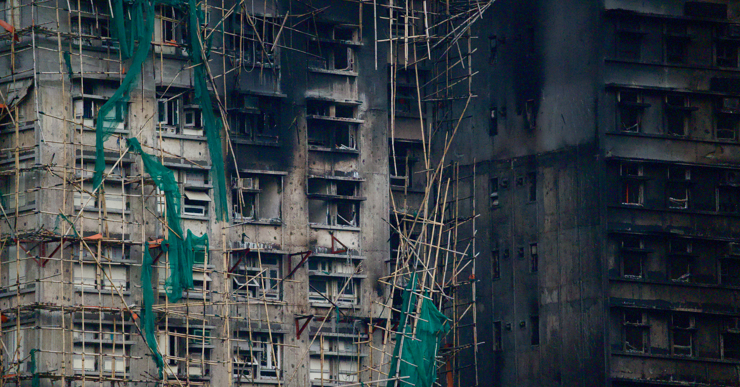 Authorities have said substandard (green) plastic mesh and insulation foam used during renovation work at the doomed estate likely fuelled the 40-hour inferno, while fire alarms were also not operating properly.