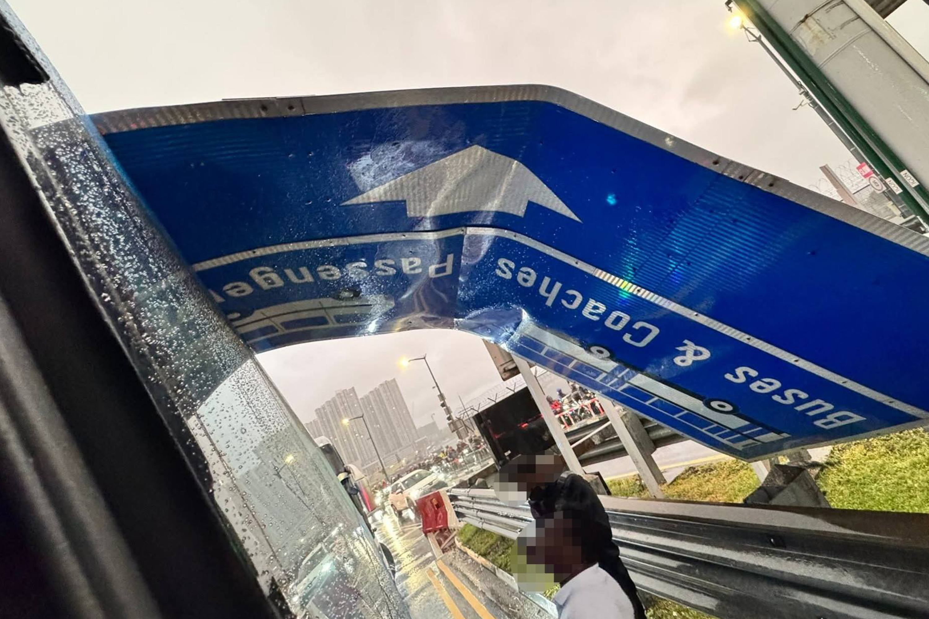 Passengers on board the bus were able to get out as the fallen signage did not obstruct the exit.