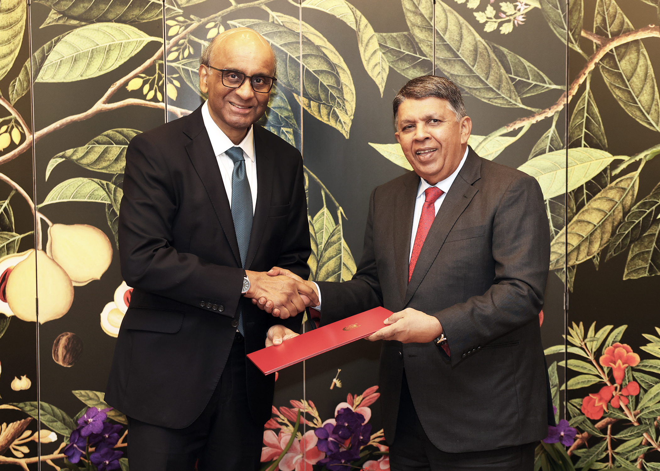 Patrick Daniel (right), receiving his letter of credence from President Tharman Shanmugaratnam on July 21. He has been appointed as Singapore's next non-resident high commissioner to Sri Lanka.