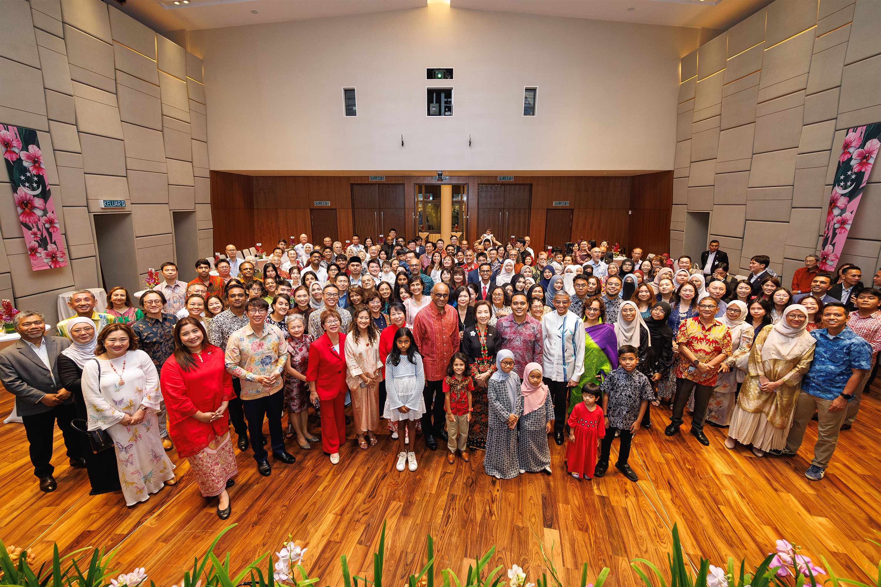 President Tharman Shanmugaratnam in a group photo with some 150 Singaporeans working and living in Malaysia at a reception held on July 13.