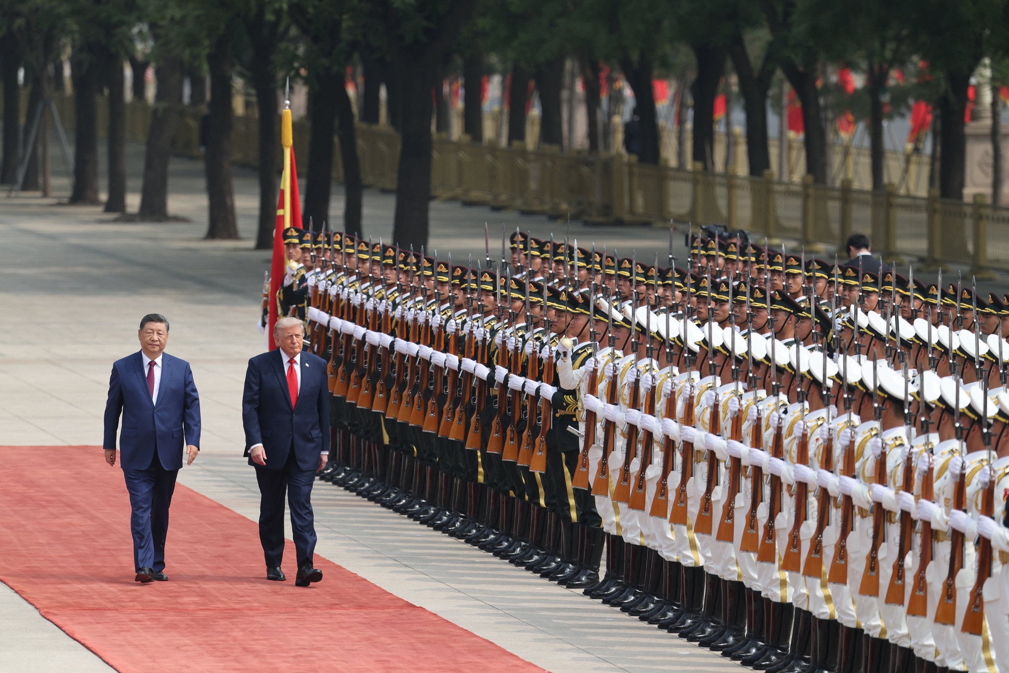 Chinese President Xi Jinping with US President Donald Trump during the latter's visit to Beijing on May 14.