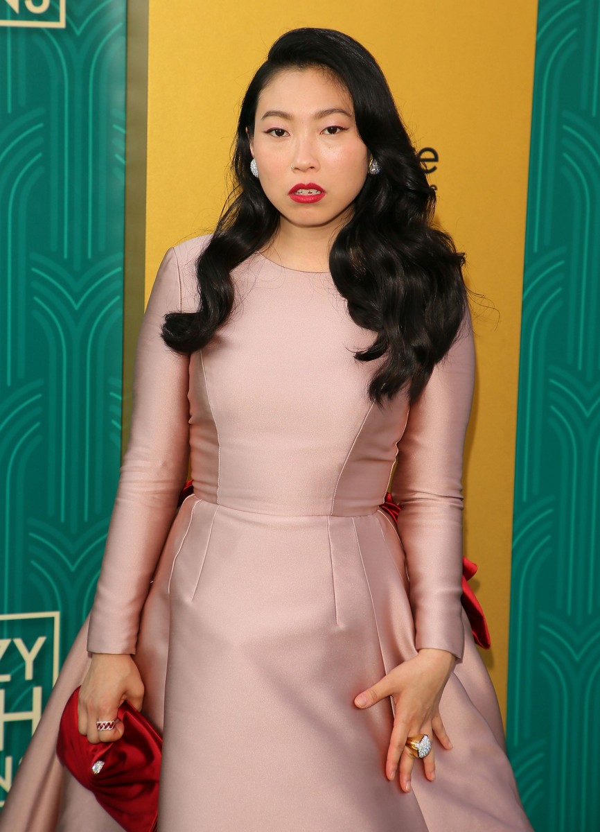 Singapore actors Fiona Xie, Pierre Png work the Crazy Rich Asians red