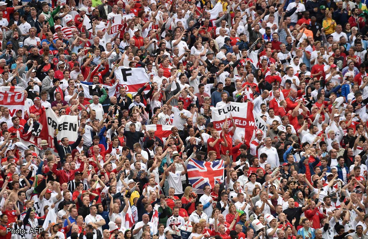 Football England fan's ear bitten off during Uruguay game, News AsiaOne