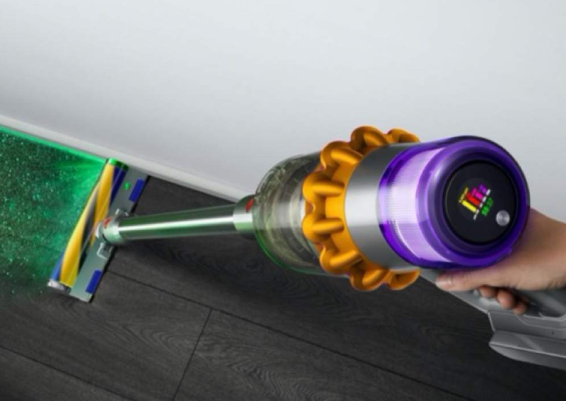 The new Dyson V15 vacuum uses a green laser so that no dirt escapes its