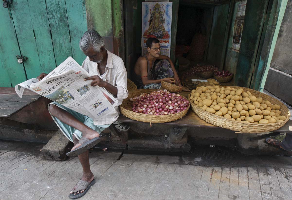 Tears as India's soaring onion cost poses challenge for Modi, Asia News