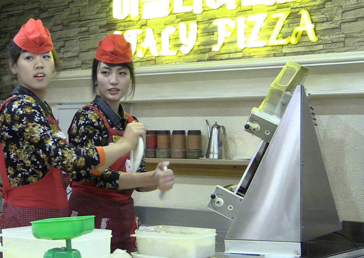 North Korean waitresses making dough style | Tipping in North Korea