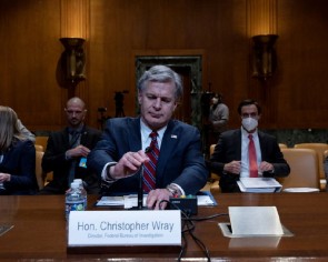 Heads of FBI and MI5 raise alarms about Chinese spying in rare joint speech