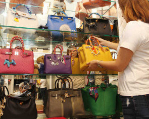 Primary school teacher blows $90,000 on luxury handbags