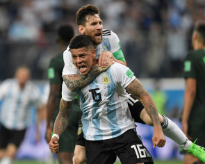 Messi&#039;s Argentina save World Cup hopes with last-gasp goal