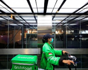 Grab sees rebound in ride-hailing as offices reopen
