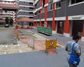 Plaster falls 12 storeys from HDB block in Hougang