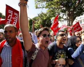 Tunisians protest economic amnesty bill