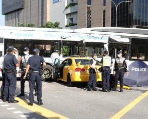 Car crashes head first into bus in Woodlands, 2 killed and 8 injured