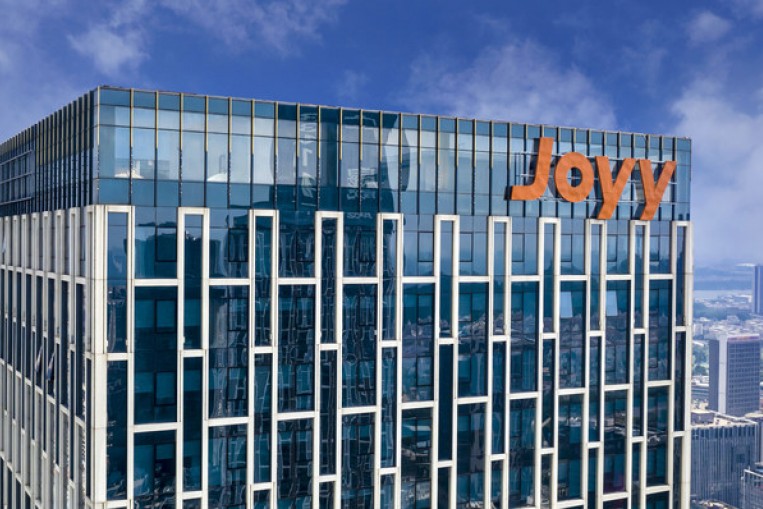 JOYY Reports Fourth Quarter and Full Year 2021 Results, Achieving First
