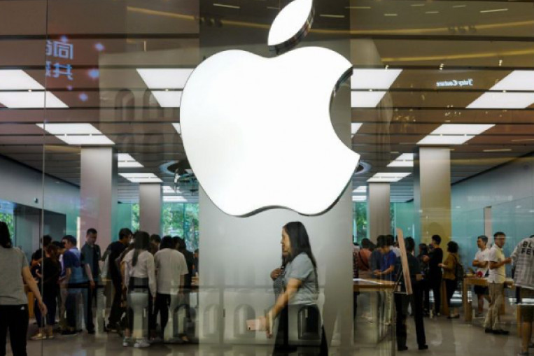 Apple, Louis Vuitton, Gucci and other luxury brands drop China prices as tax cuts come into ...