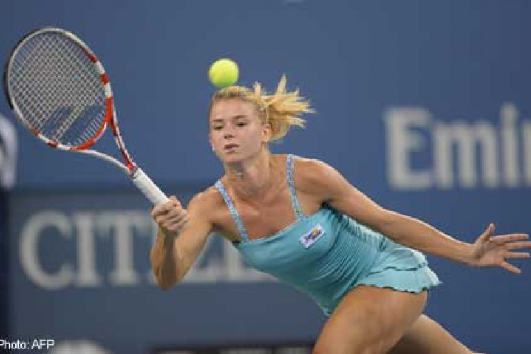 Tennis: Tiny blonde bombshell Giorgi goes wild at Open, News - AsiaOne
