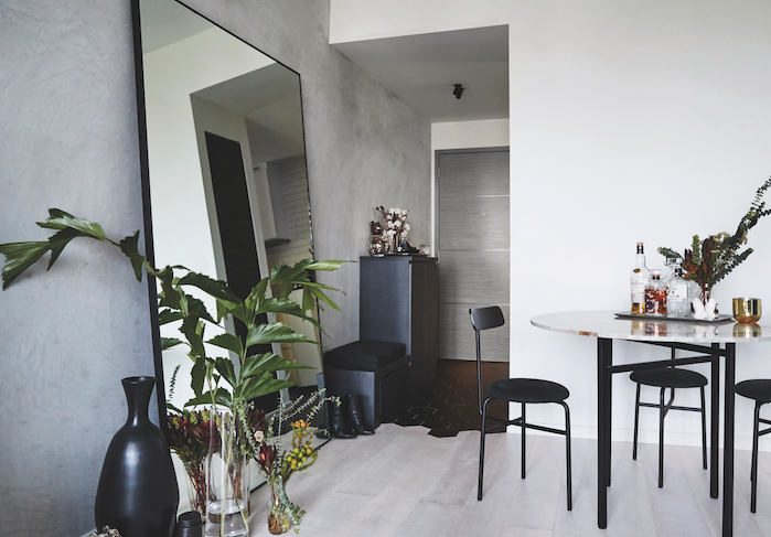 Creative couple's sleek and stylish 2-plus-1-bedroom condominium