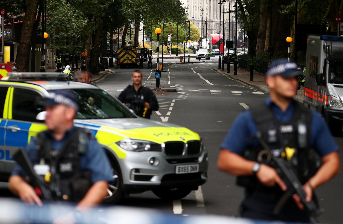 Man arrested, pedestrians injured as car hits barriers at UK parliament