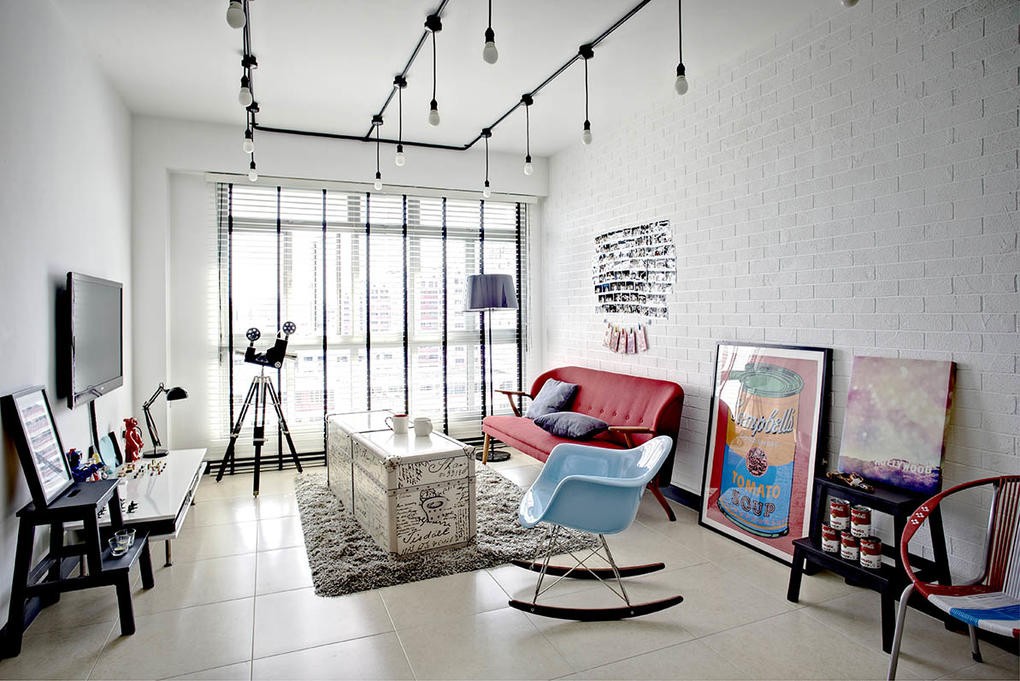 This industrial-style 4-room flat has a unique hanging light bulb feature